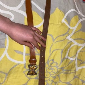 brown belt with butterfly buckle
